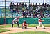 Children playing baseball at Ciudad Deportiva.